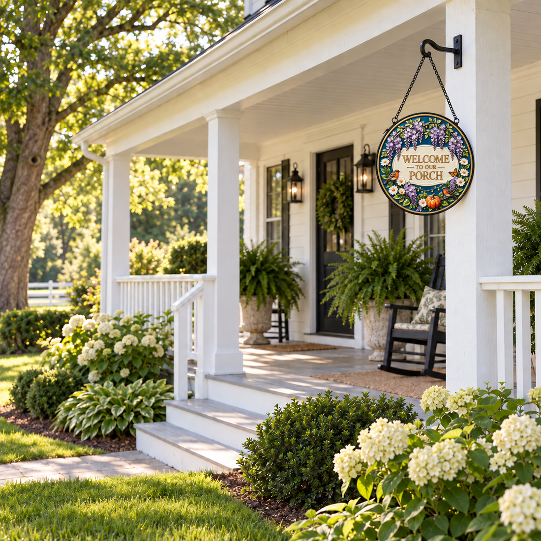 Wide outdoor display of Welcome to Our Porch round hanging art