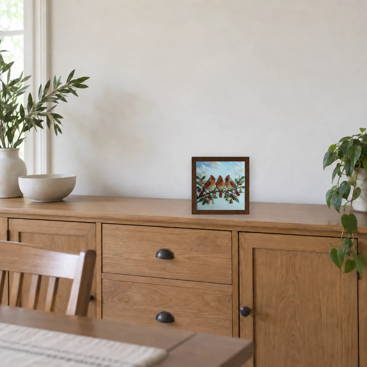 Winter Cardinals shown to approximate scale in a warm minimalist room